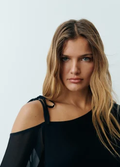 Blusa asimétrica manga larga