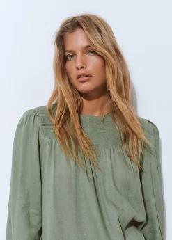 Blusa cuello redondo smock en pico