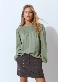 Blusa cuello redondo smock en pico