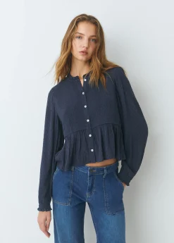 Blusa smock con botones plumeti