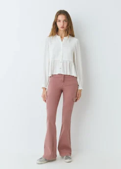 Blusa smock con botones plumeti