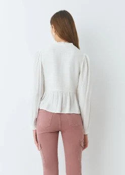 Blusa smock con botones plumeti