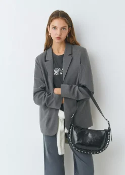 Bolso bandolera tachas