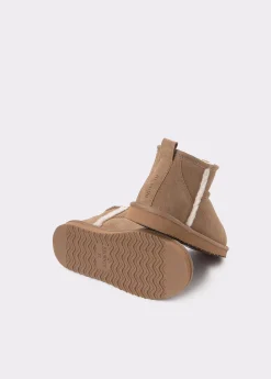 Botín bajo piel pelo