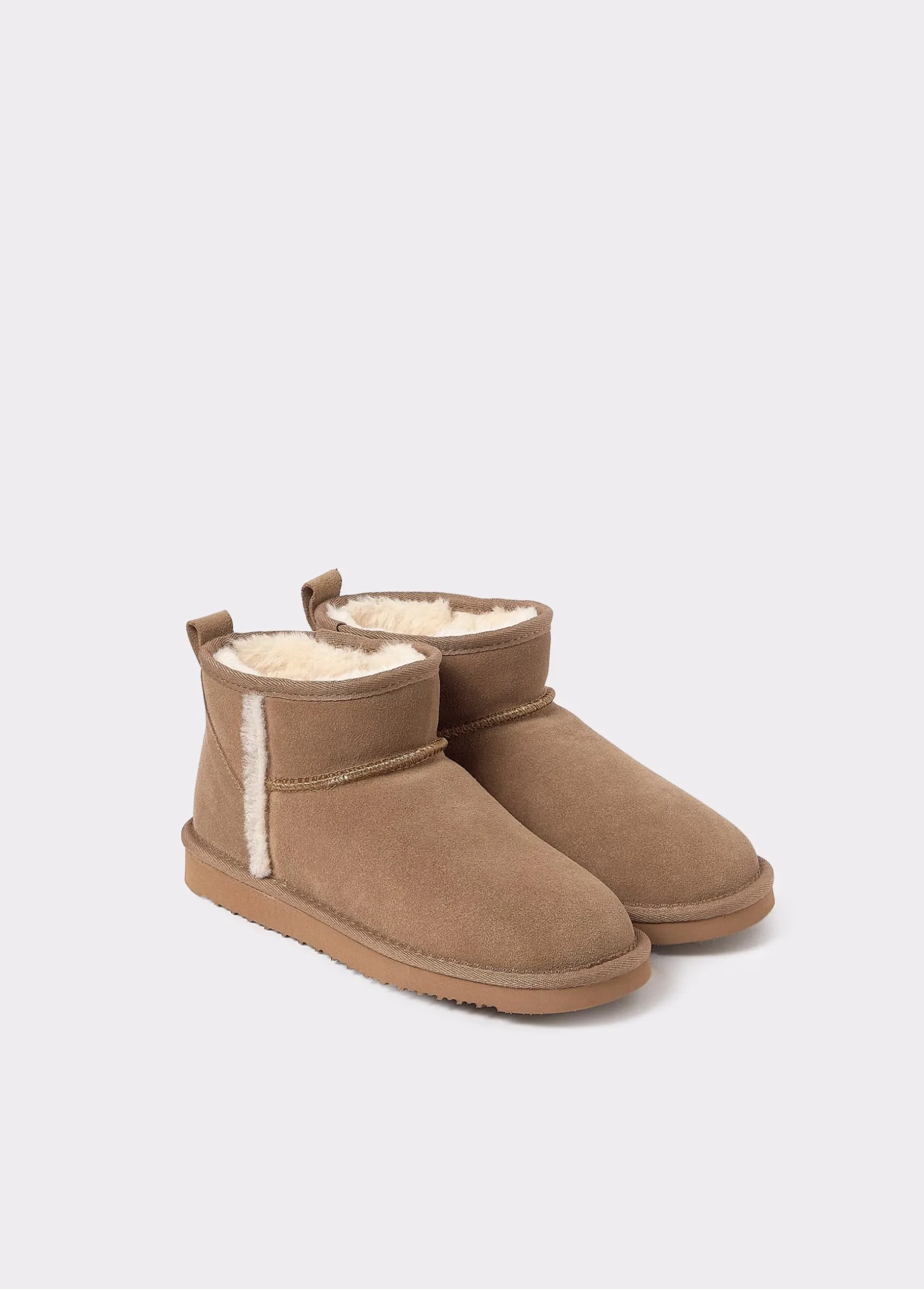 Botín bajo piel pelo