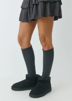 Botín bajo piel pelo