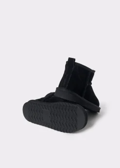 Botín bajo piel pelo