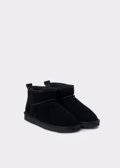 Botín bajo piel pelo