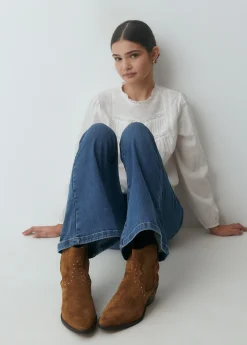 Botín piel tachitas