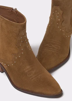 Botín piel tachitas