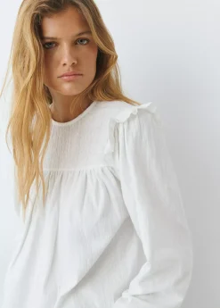 Camiseta estilo blusa con volante