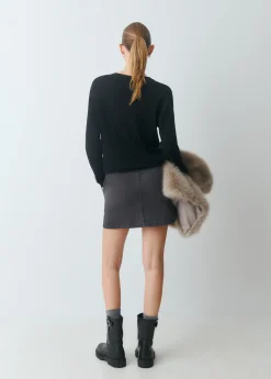 Falda bolsillos frontales