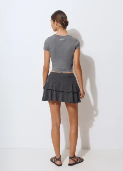 Falda corta volantes tejido estructura