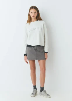 Falda estrellas bordadas