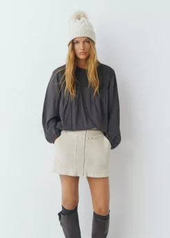 Falda pana apertura tachas