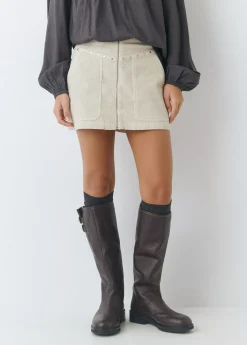 Falda pana apertura tachas