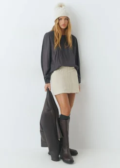 Falda pana apertura tachas