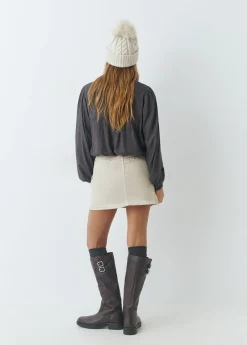 Falda pana apertura tachas