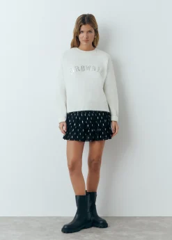 Falda volantes brillo