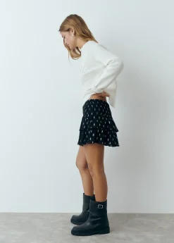 Falda volantes brillo