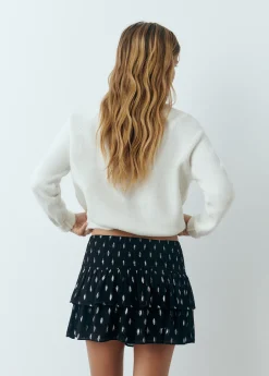 Falda volantes brillo