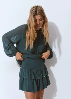 Falda volantes detalle tachas