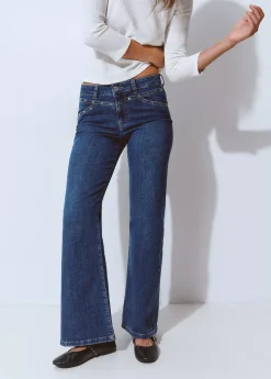 Jeans culotte tachas