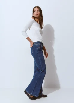 Jeans culotte tachas