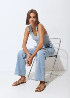 Jeans culotte tachas