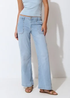 Jeans culotte tachas