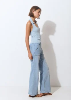 Jeans culotte tachas