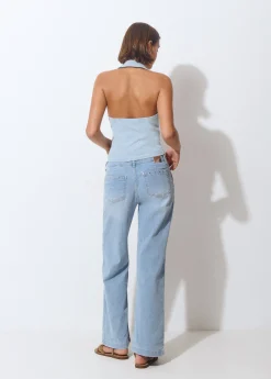 Jeans culotte tachas