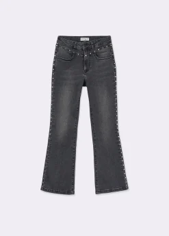 Jeans flare cropped tachas