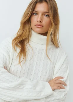 Jersey cuello alto trenzas