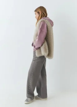 Pantalón tachas laterales