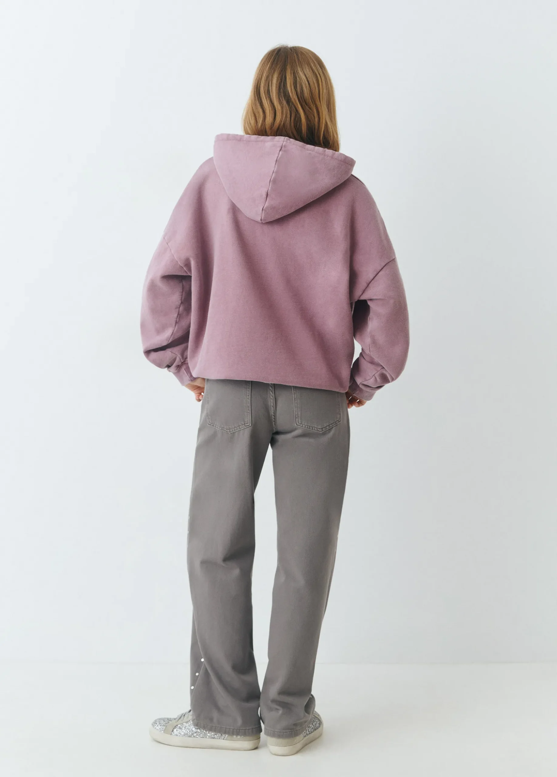 Pantalón tachas laterales