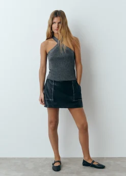 Top cruzado tachas hilo metalizado