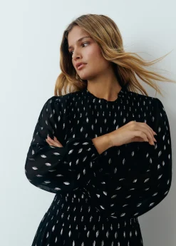 Vestido brillo smock cintura